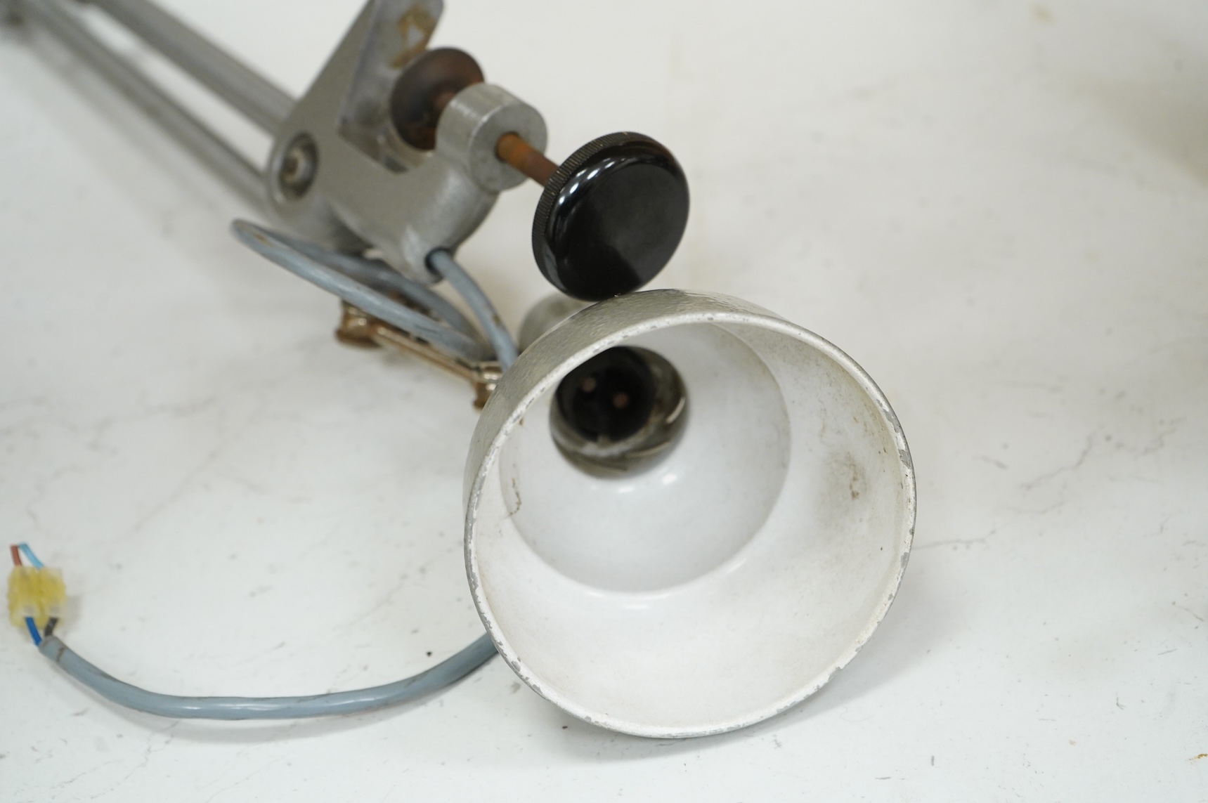 A Lumina industrial folding anglepoise lamp